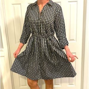 Black and white wrap tie button front dress